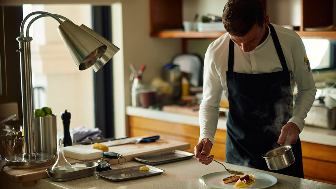 Chef plating a dish